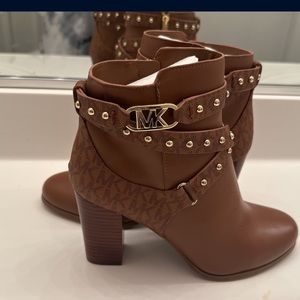 Brand new, never worn Michael Kors boot heels